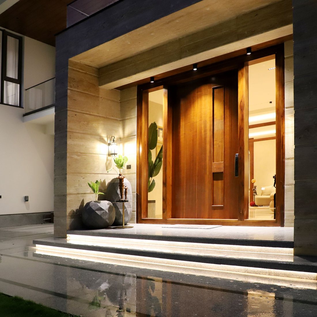 Warmly lit home entrance at night — marketing that sells